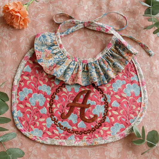 Monogrammed Quilted Ruffle Bib